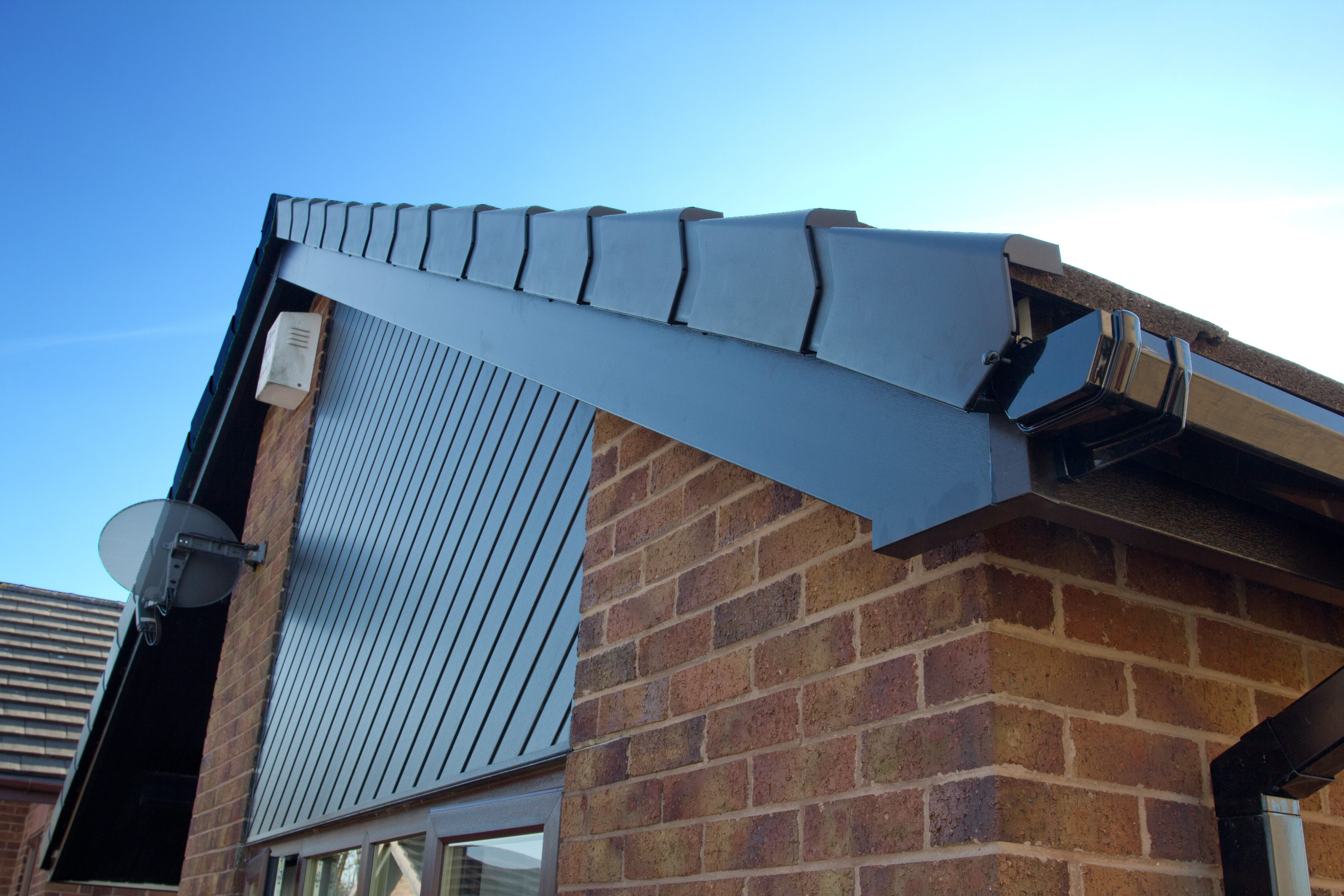 Anthracite grey fascias and soffits being installed